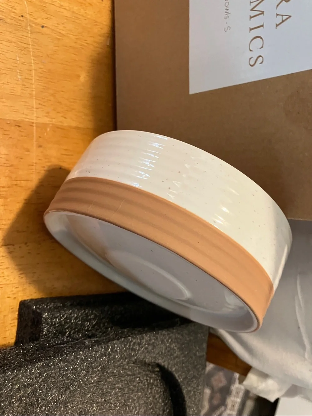 New.  Mora Ceramics tan n white dog bowl in perfect condition